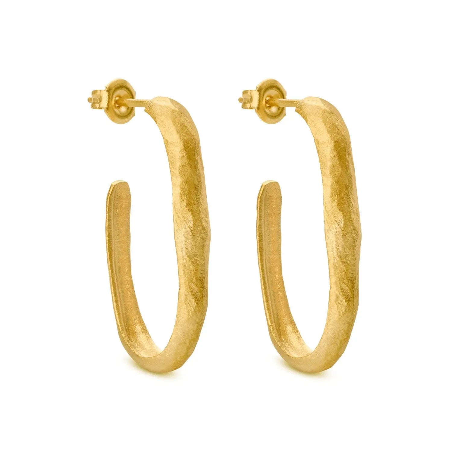 Gold hoop earrings on a white background