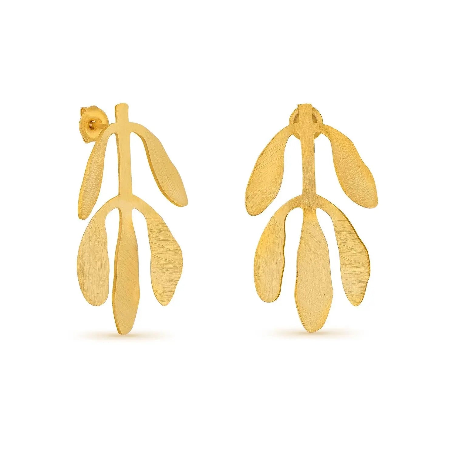 Gold leaf-shaped earrings on a white background