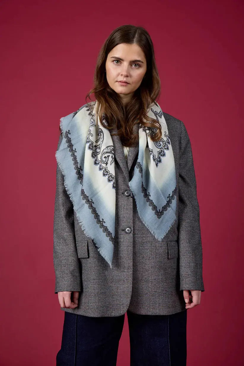 Model wearing Paisley pattern wool scarf